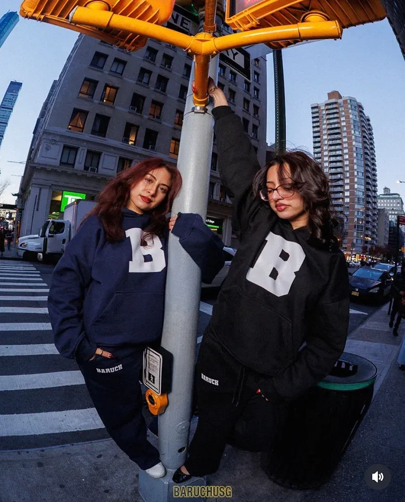 Model wearing custom Baruch College branded hoodie